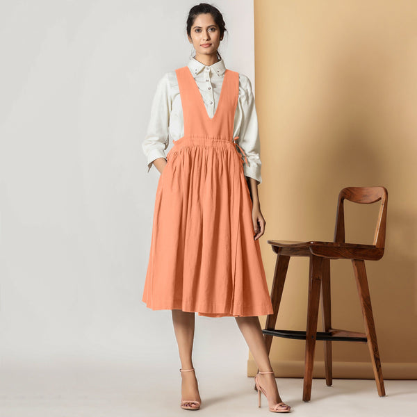 Front View of a Model wearing Peach Cotton Flax Pinafore Midi Wrap Dress