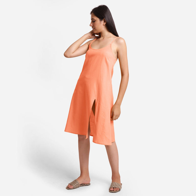 Left View of a Model wearing Peach Cotton Flax Strappy Slit Dress