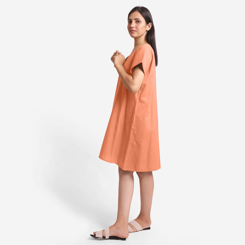Left View of a Model wearing Peach Cotton Flax V-Neck Tunic