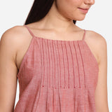 Front Detail of a Model wearing Peach Cotton Spaghetti Flared Top