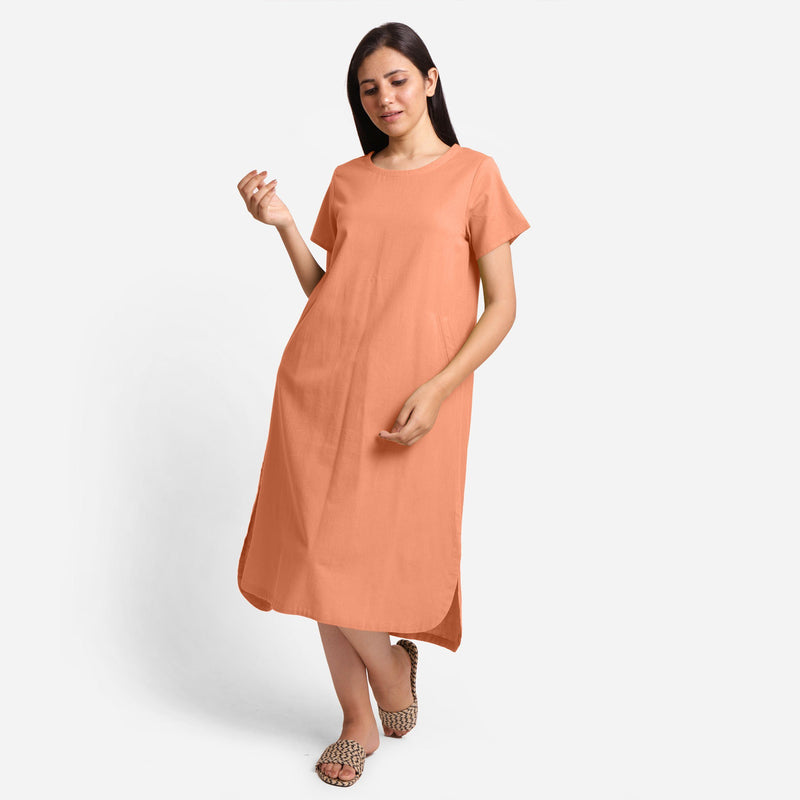 Front View of a Model wearing Peach Cotton Welt Pocket Shift Dress