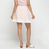 Back View of a Model wearing Peach Cotton Chambray A-Line Skirt