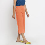Right View of a Model wearing Peach Mid-Rise Cotton Flax Culottes
