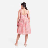 Back View of a Model wearing Peach Paisley Block Print Cotton Knee Length Dress