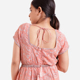 Back Detail of a Model wearing Peach Block Print Floor Length Cotton Jumpsuit