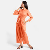 Left View of a Model wearing Peach Wide Legged Cotton Overall