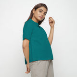 Right View of a Model wearing Pine Green 100% Linen A-Line Top
