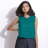 Front View of a Model wearing Pine Green 100% Linen Button-Down Short Top