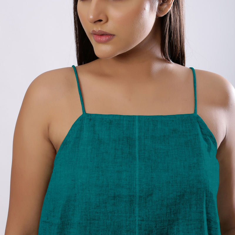 Front Detail of a Model wearing Pine Green 100% Linen Flared Camisole Top