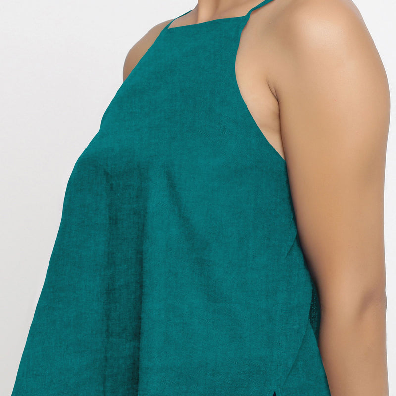 Front Detail of a Model wearing Solid Pine Green 100% Linen Relaxed Spaghetti Top