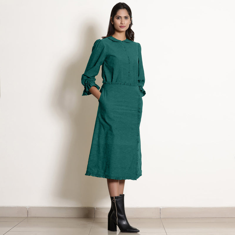 Front View of a Model wearing Warm Pine Green A-Line Frilled Skirt
