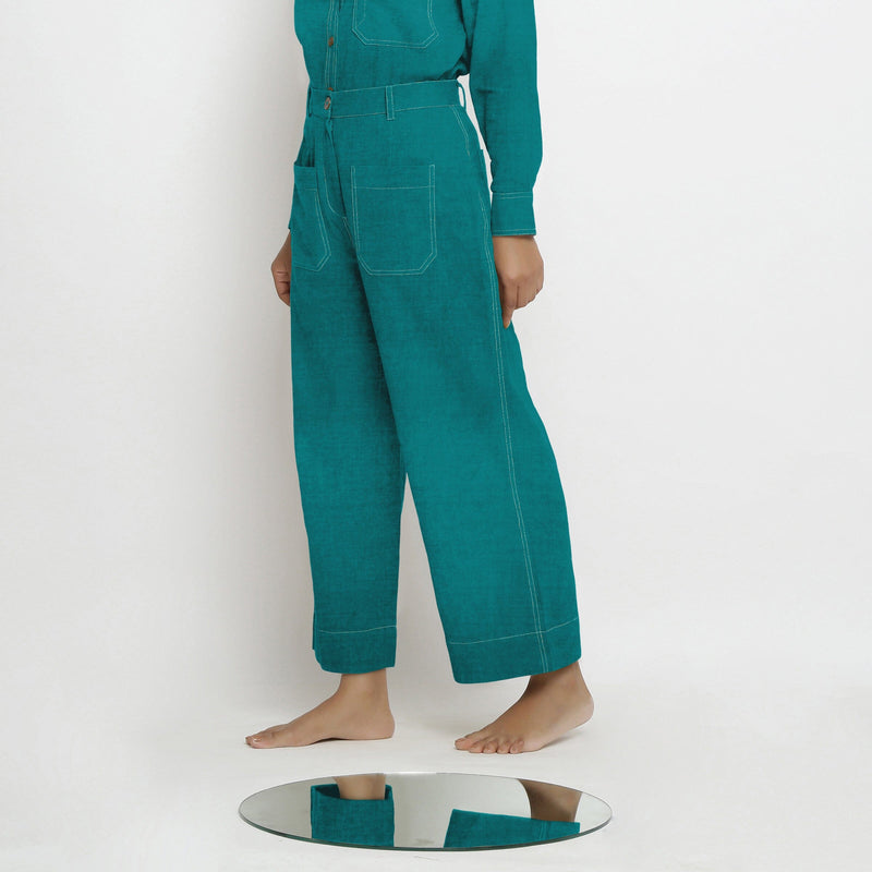 Left View of a Model wearing Pine Green Linen Patch Pocket Wide Legged Pant