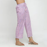 Right View of a Model wearing Pink and Blue Block Printed Cotton Pant