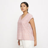 Left View of a Model wearing Pink And White Hand Screen Print Gathered Top