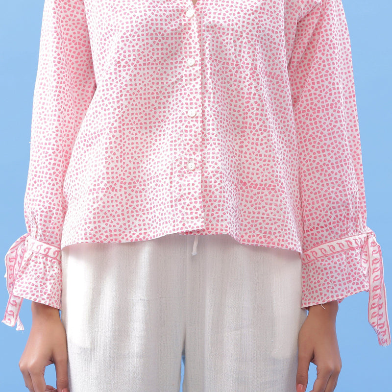 Front Detail of a Model wearing Pink Button-Down Blouse and Tapered Pant Set
