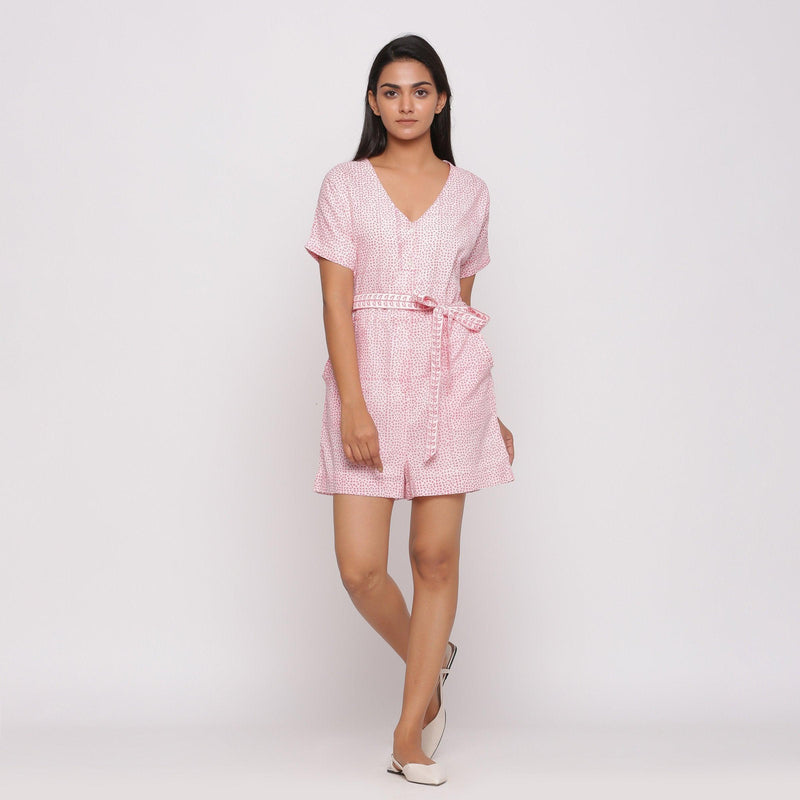 Front View of a Model wearing Pink Button-Down Short V-Neck Romper