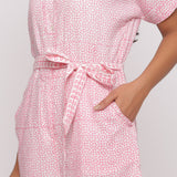 Front Detail of a Model wearing Pink Ditsy Block Print Cotton Short Romper