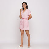 Left View of a Model wearing Pink Ditsy Block Print Cotton Short Romper