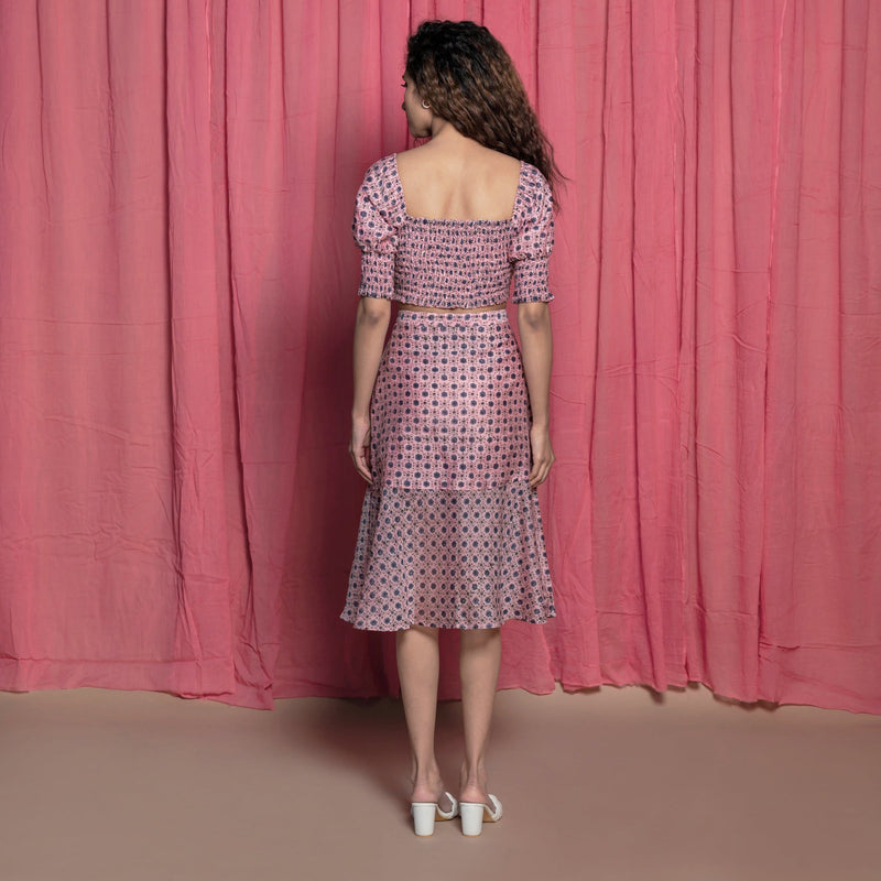 Back View of a Model wearing Pink Chanderi Hand Block Print Peplum Skirt