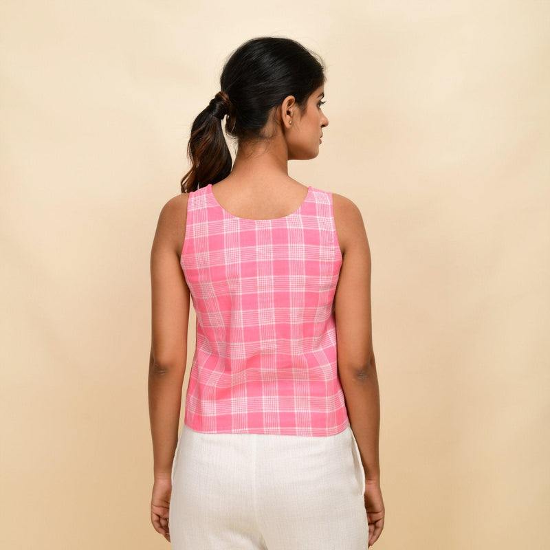 Back View of a Model wearing Pink Checks Cotton Muslin Sleeveless Round Neck Top
