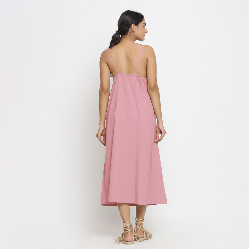 Back View of a Model wearing Pink Cotton Flax Strap Sleeve A-Line Dress