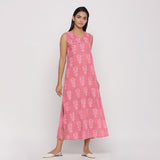 Right View of a Model wearing Pink Floral Dabu Block Print Cotton Maxi Dress