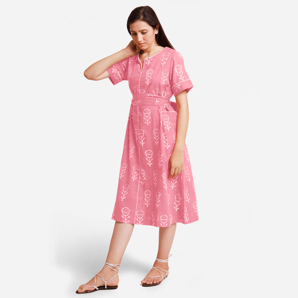 Left View of a Model wearing Pink Dabu Block Printed Cotton Midi Dress