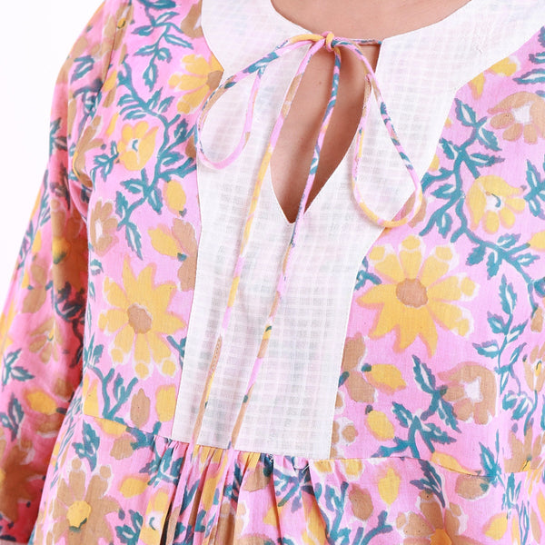 Front Detail of a Model wearing Pink Floral Block Print Frilled Sleeve Cotton Top