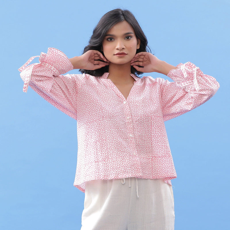 Front View of a Model wearing Pink Hand Block Printed Button-Down Blouse
