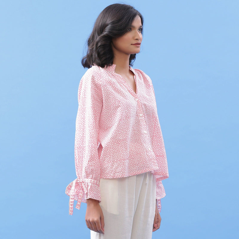 Right View of a Model wearing Pink Hand Block Printed Button-Down Blouse