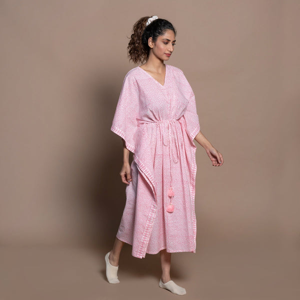 Right View of a Model wearing Pink Hand Block Printed Cotton Midi Kaftan Dress