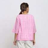 Back View of a Model wearing Pink Hand Tie-Dye Cotton Round Neck A-Line Top