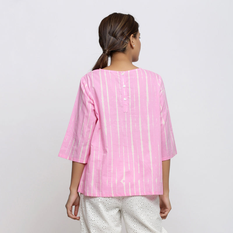 Back View of a Model wearing Pink Hand Tie-Dye Cotton Round Neck A-Line Top