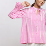 Front Detail of a Model wearing Pink Tie-Dye 100% Cotton Shirred Blouson Top