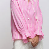 Close View of a Model wearing Pink Hand Tie Dyed Shirred Blouson Top