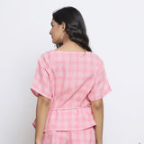 Back View of a Model wearing Pink Checks Handspun Cotton Muslin Loose Fit Boat Neck Top