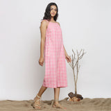 Right View of a Model wearing Pink Checks Handspun Cotton Strap Sleeve Midi Jumpsuit