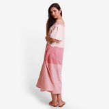 Left View of a Model wearing Pink Off Shoulder 100% Cotton Flared Maxi Dress