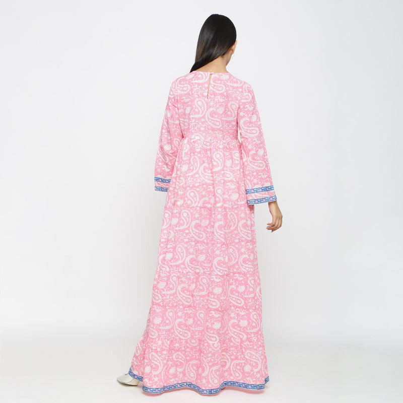 Back View of a Model wearing Pink Paisley Floor-Length Tier Dress