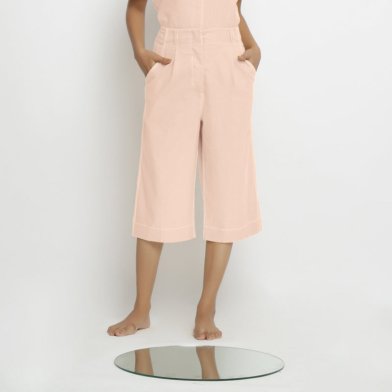 Front View of a Model wearing Vegetable Dyed Pink 100% Cotton Mid-Rise Culottes