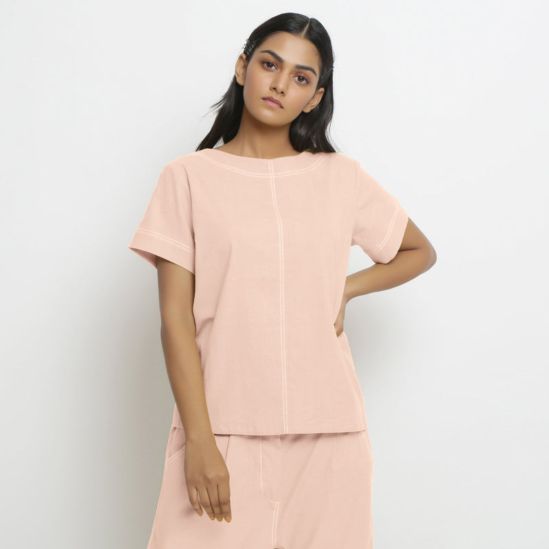 Front View of a Model wearing Vegetable-Dyed Pink 100% Cotton Paneled Top