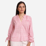 Front View of a Model wearing Pink Sanganeri Block Print Cotton Ruffled Collar Blouse