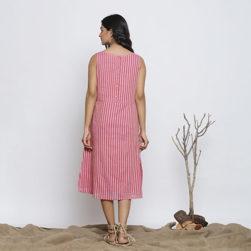 Back View of a Model wearing Pink Striped Sleeveless Paneled Dress