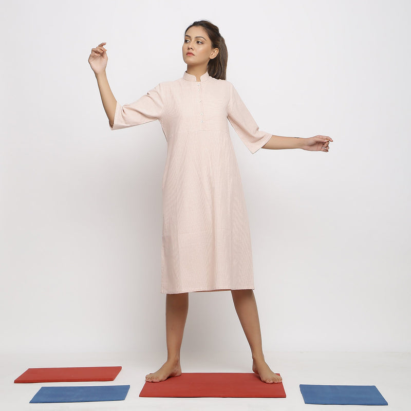 Front View of a Model wearing Pink Vegetable Dyed Button-Down Dress