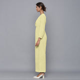 Left View of a Model wearing Pista Yellow Corduroy Comfy Jumpsuit