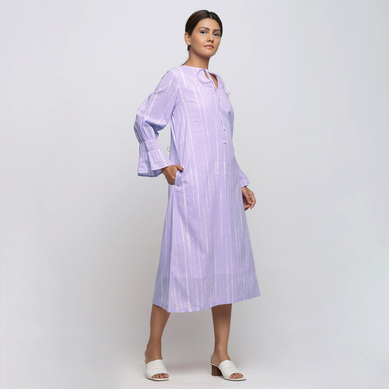 Right View of a Model wearing Poet Sleeves Cotton Lavender Yoke Dress