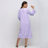 Back View of a Model wearing Poet Sleeves Cotton Lavender Yoke Dress