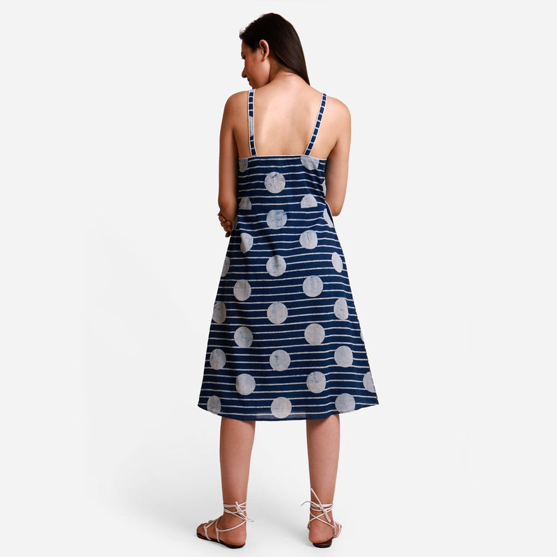 Back View of a Model wearing Polka Dot Block Printed Asymmetrical Cotton Midi Dress