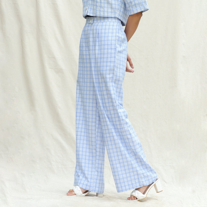 Left View of a Model wearing Powder Blue Checks Cotton High-Rise Wide Legged Pant