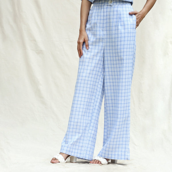 Left View of a Model wearing Powder Blue Checks Cotton High-Rise Wide Legged Pant